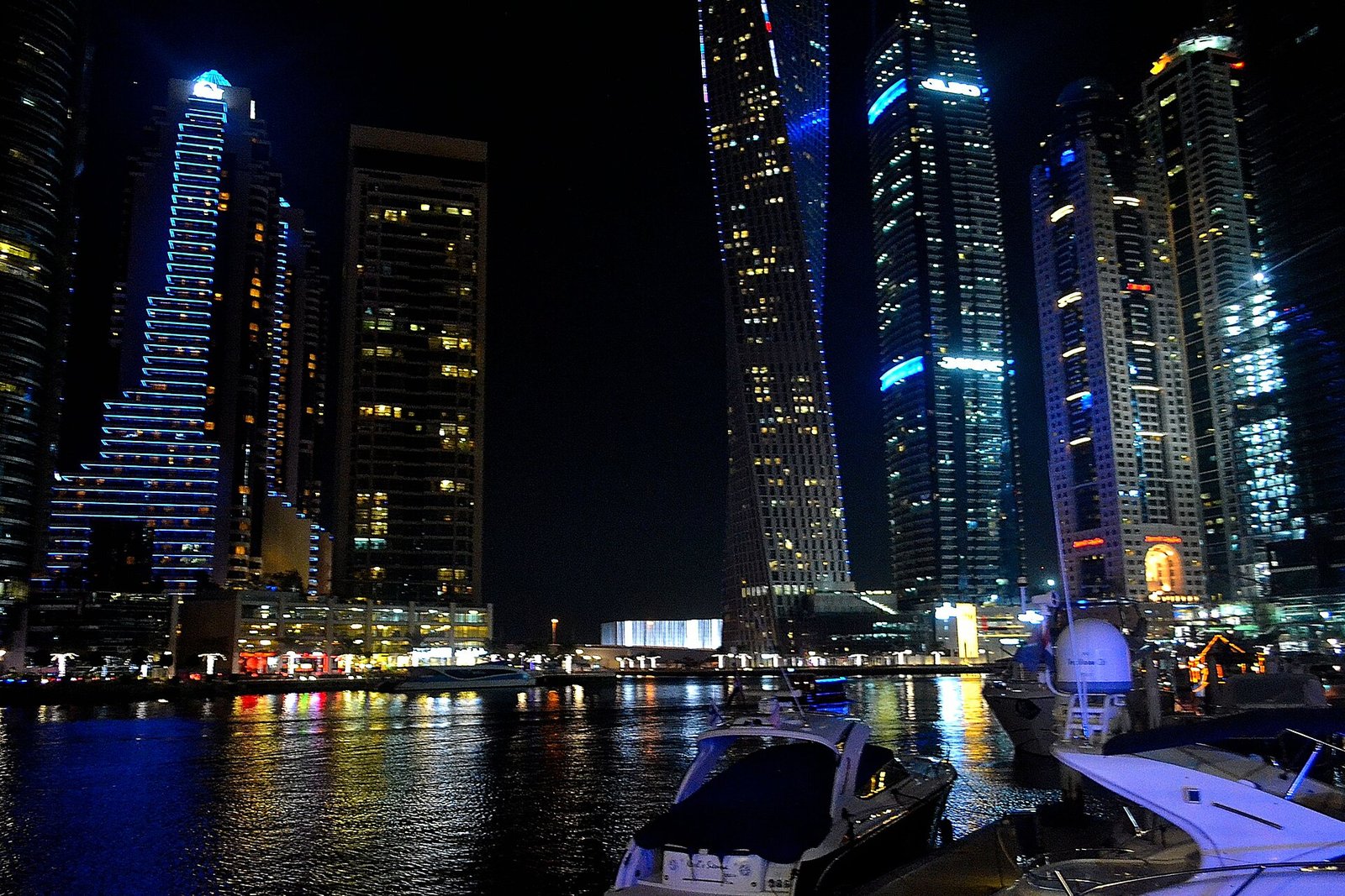 Dubai Marina towers at night, reflecting the luxury apartment market DAMAC helped create