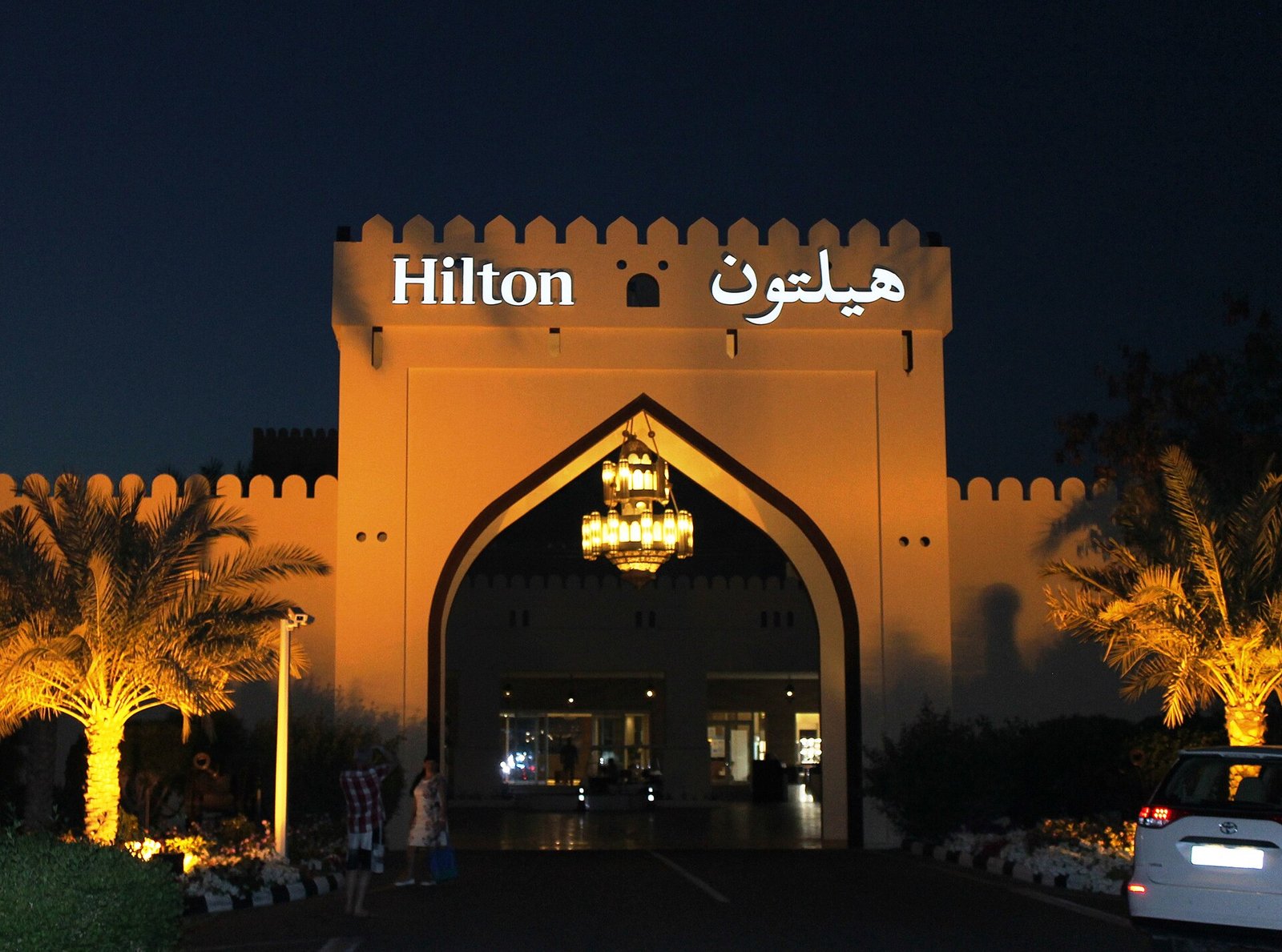 Sandy beach and resort buildings in Ras Al Khaimah with calm sea water