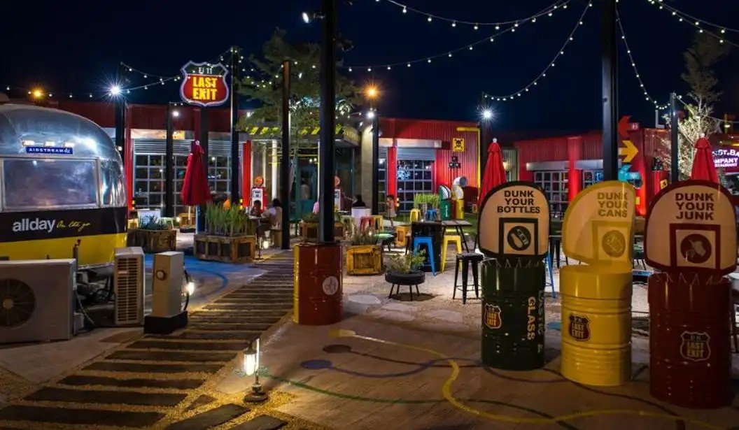 Food trucks with colourful branding at the Last Exit DXB Bound park on Sheikh Zayed Road