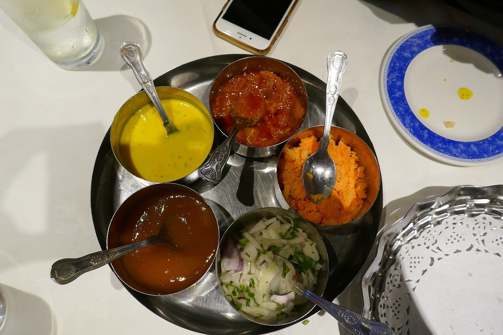 Indian restaurant dishes served at a table