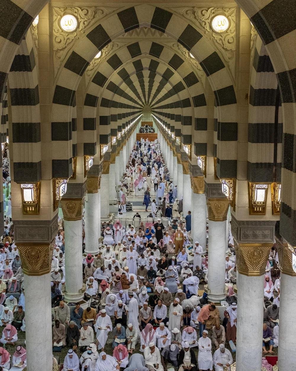 Prayer hall interior of a Dubai mosque with columns and carpet